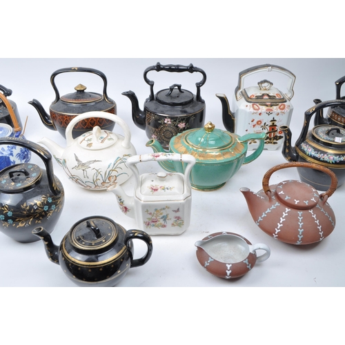 194 - A Large collection of 19th and 20th century ceramica and porcelain teapots to include Aesthetic Move... 