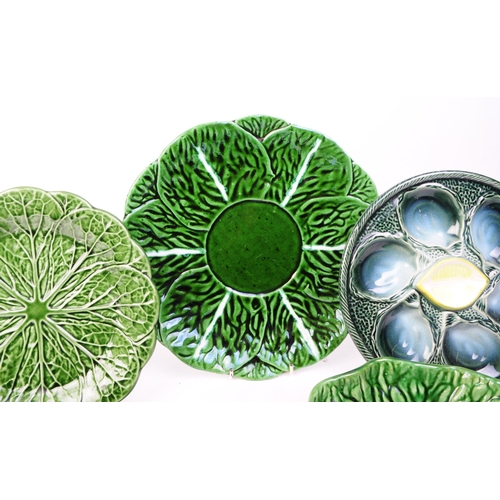 2 - Collection of five late 20th century majolica plates, comprised of two French oyster dishes numbered... 