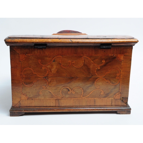 217 - Early 20th century Walnut veneer sewing box with a sloping hinged lid featuring a pin cushion mounte... 