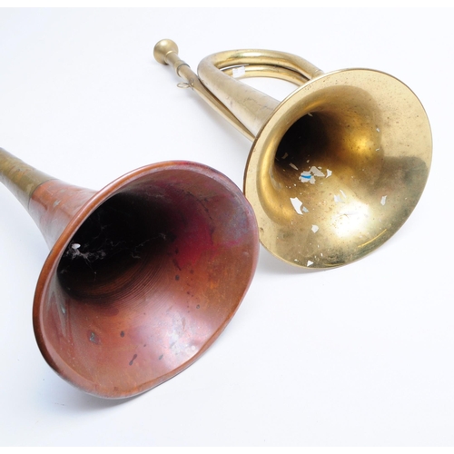 222 - 20th century post horn and bugle. Post horn is brass and numbered 819 to the handle. Bugle is copper... 