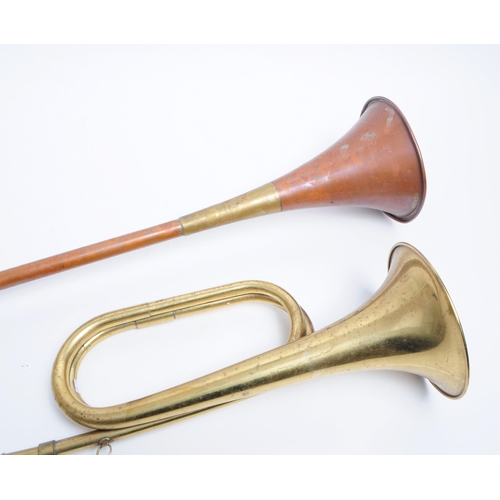 222 - 20th century post horn and bugle. Post horn is brass and numbered 819 to the handle. Bugle is copper... 