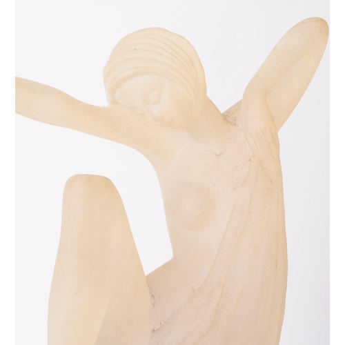 224 - Late 20th century resin art deco style dancer figure depicted half nude and draped in fabric. Raised... 