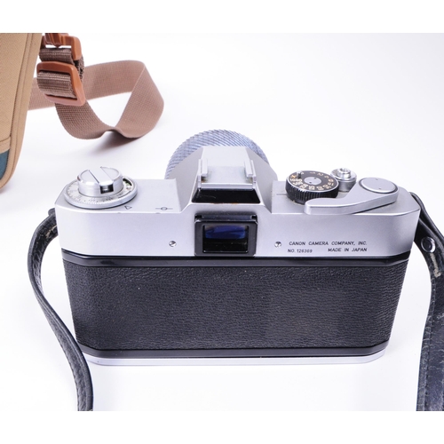 228 - Canon - A vintage mid 20th century Canon FP 35mm SLR camera. The camera in silver colourway, alongsi... 