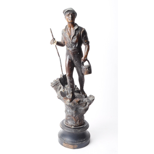 230 - Two early 20th century French spelter figurines from the L'Agriculture series depicting male and fem... 