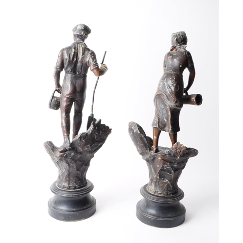 230 - Two early 20th century French spelter figurines from the L'Agriculture series depicting male and fem... 