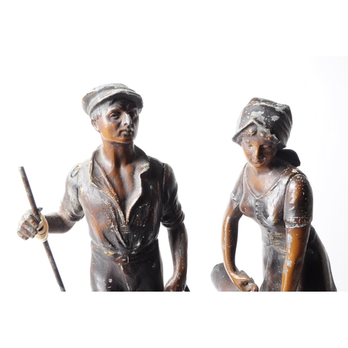 230 - Two early 20th century French spelter figurines from the L'Agriculture series depicting male and fem... 