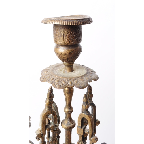 236 - Two Victorian late 19th century brass garniture candelabra. Both features ornate detailing, four arm... 