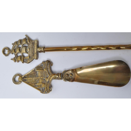 239 - 20th century brass fireside implements, comprised of dust pans, brushes, pokers, and shovels. Each t... 