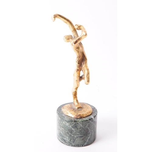 243 - A 20th century cast bronze and marble dancer figure statue. The figure in the form of a dancer, pose... 