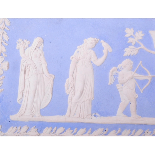 245 - Early 20th century Wedgwood style plaster plaque, in two shades of blue and depicting white relief c... 