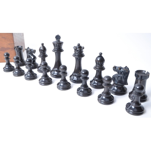 251 - A vintage 20th century turned wooden chess set. Having all thirty two pieces, in Staunton pattern. H... 