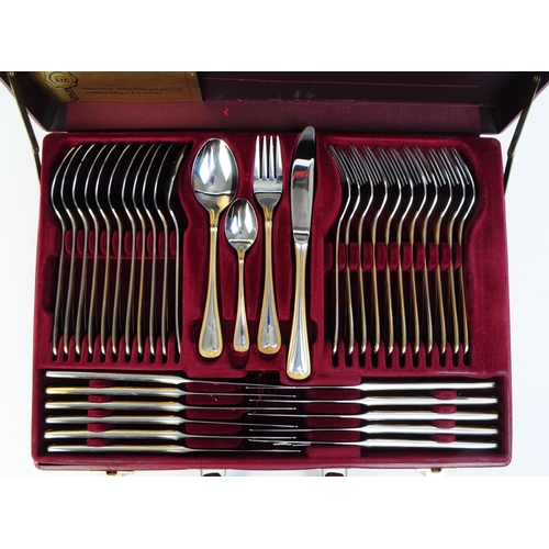 254 - Solingen - West German 1829 23-4 carat gold plated twelve setting cutlery canteen with certificate o... 