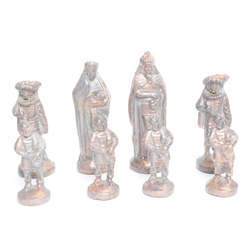 269 - 20th century cast metal full chess set comprised of medieval style figures. Largest piece measuring ... 