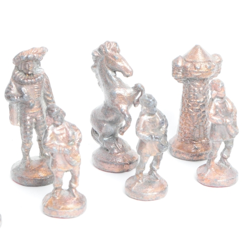 269 - 20th century cast metal full chess set comprised of medieval style figures. Largest piece measuring ... 