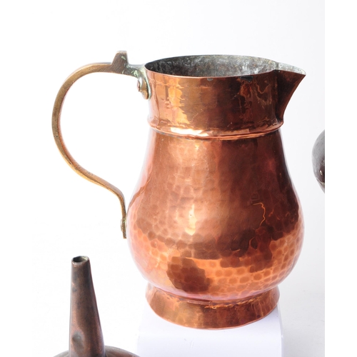 270 - Collection of early 20th century copper items, comprised of three coffee pots, a hammered jug, funne... 