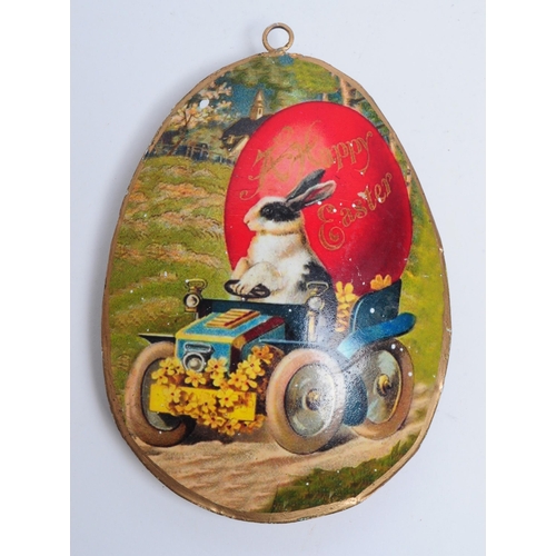 281 - Vintage late 20th century Easter egg decoration. Featuring a meal egg shaped hanging decoration with... 