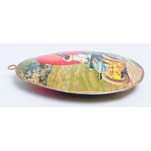 281 - Vintage late 20th century Easter egg decoration. Featuring a meal egg shaped hanging decoration with... 