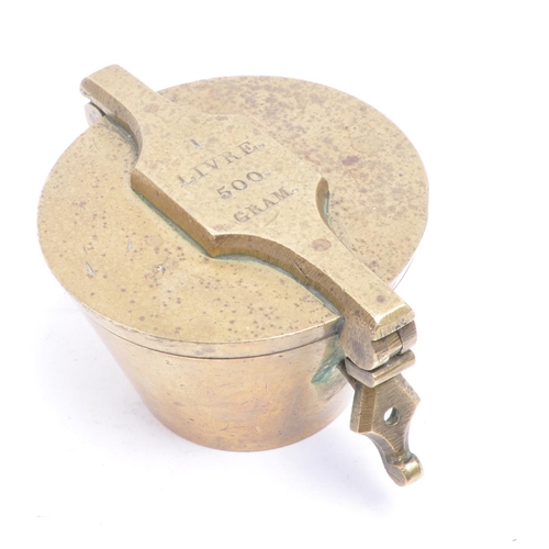 286 - 20th century brass apothecary weights / scales. Overall weighing 500 grams with the brass container ... 