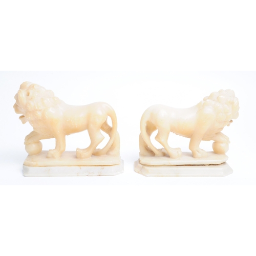 292 - Two 19th century alabaster stone carved lion statues / sculptures. (AF) Measuring approx. 11.5cm x 1... 