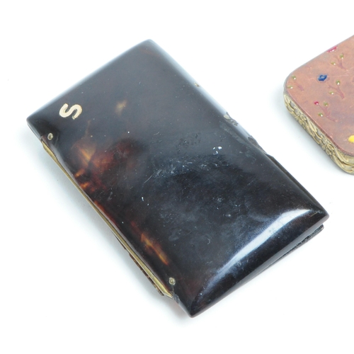 294 - Two early 20th century compact / trinket cases, comprised of a tortoiseshell brass hinged cigarette ... 