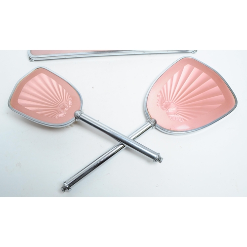 296 - An Art Deco style late 20th century vanity dressing table set. To include hair brush, hand held mirr... 