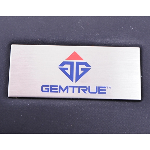 301 - GemTrue - A GemTrue plus diamond tester, alongside a Mizar M24 electronic gold tester. Each in origi... 