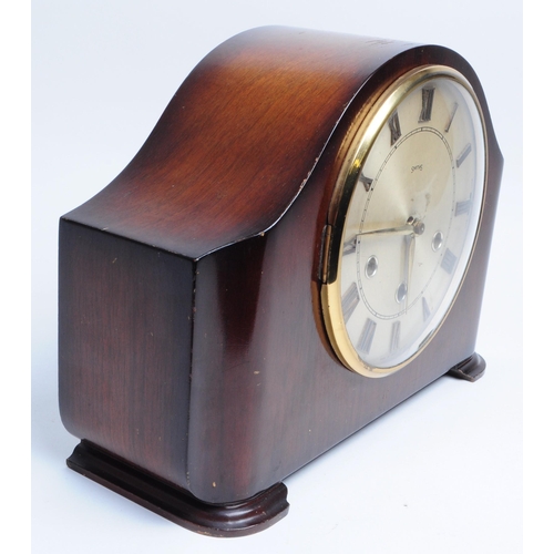 304 - Smiths - Early 20th century art deco mahogany cased mantel clock. Metal clock face with a glazed fro... 