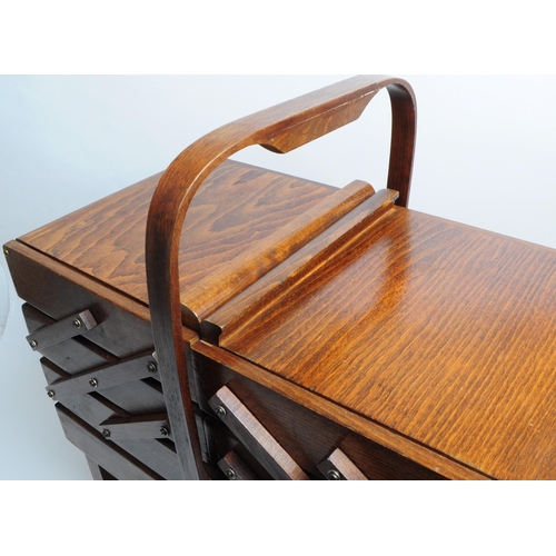 306 - Vintage 20th century wooden cantilever sewing box raised on four square legs. Box able to be extende... 