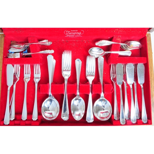 308 - Insignia Plate - A vintage 20th century Tarnprufe silver plated stainless steel cutlery canteen. The... 