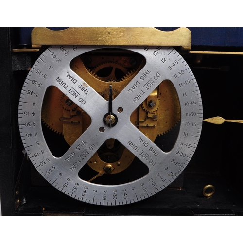 315 - An early 20th century travel portable time recorder. Brass turn handles with wooden case. To interio... 