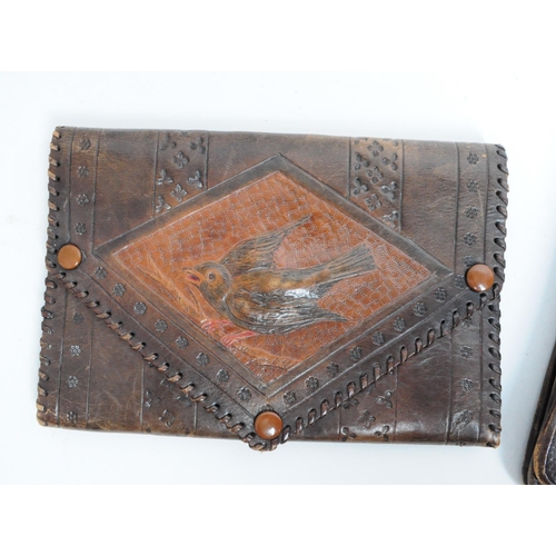 322 - A collection of vintage 20th century leather purse wallet / document holders. One flip over paper wo... 