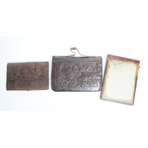 322 - A collection of vintage 20th century leather purse wallet / document holders. One flip over paper wo... 