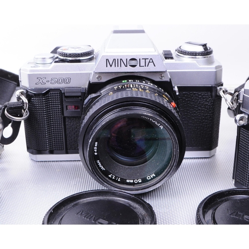 325 - Minolta - A collection of vintage mid 20th century Minolta 35mm SLR cameras and accessories. The col... 