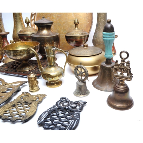 331 - A collection of early to mid mixed 20th century brass items. To include candle sticks, trivet, bowls... 