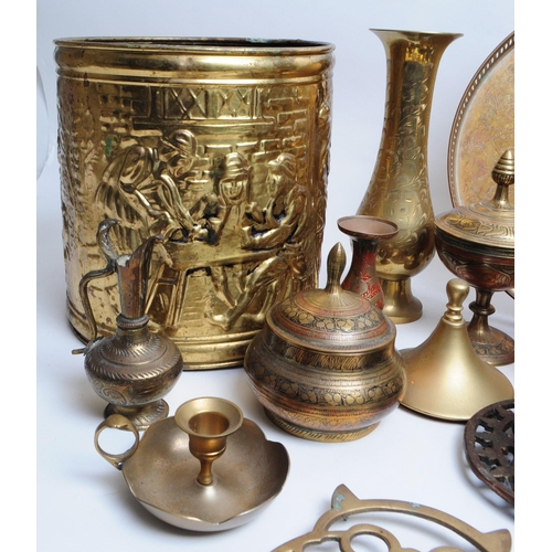 331 - A collection of early to mid mixed 20th century brass items. To include candle sticks, trivet, bowls... 