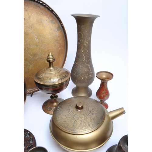 331 - A collection of early to mid mixed 20th century brass items. To include candle sticks, trivet, bowls... 