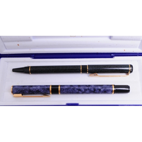 332 - Waterman - Two late 20th century French pens comprised of a textured blue cased fountain pen and a t... 