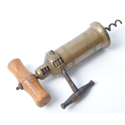 339 - Robert Jones - Early 20th century brass corkscrew with wooden handle and iron mechanism handle. Make... 