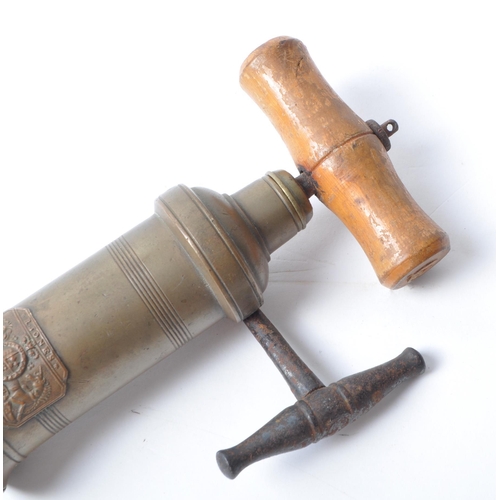 339 - Robert Jones - Early 20th century brass corkscrew with wooden handle and iron mechanism handle. Make... 