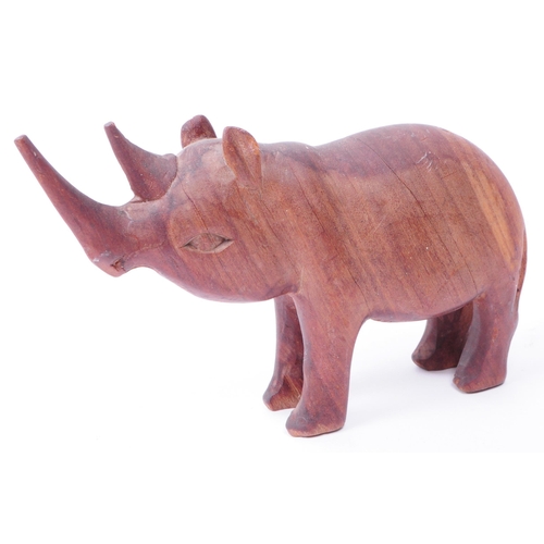 341 - A collection of vintage 20th century carved treen wooden Rhinos with one hippopotamus figures. All i... 