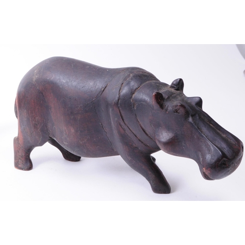 341 - A collection of vintage 20th century carved treen wooden Rhinos with one hippopotamus figures. All i... 