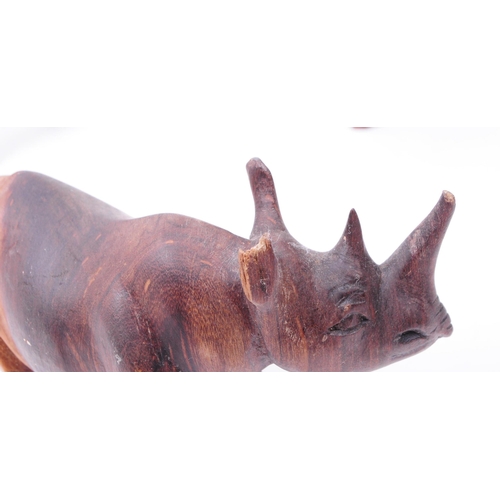 341 - A collection of vintage 20th century carved treen wooden Rhinos with one hippopotamus figures. All i... 