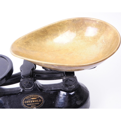 346 - Early 20th century Cotswold brass beam balanced weighing scales with weights. Black painted body wit... 