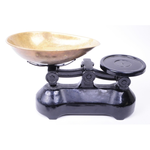 346 - Early 20th century Cotswold brass beam balanced weighing scales with weights. Black painted body wit... 