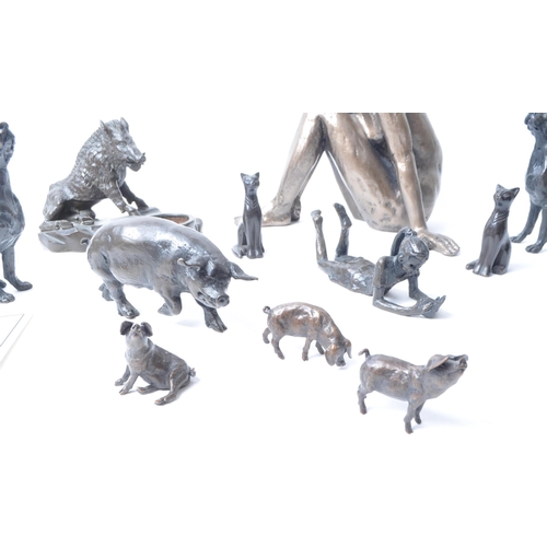 348 - Collection of assorted 20th century bronze ornamental sculptures. Including dogs, cats, pigs, a chil... 