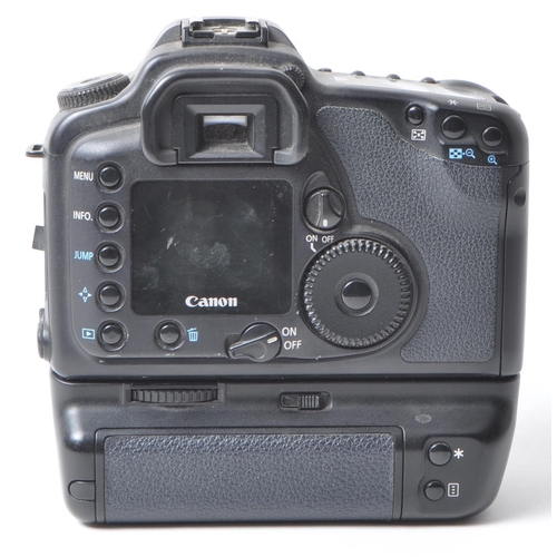 356 - Canon - A vintage circa 2003 Canon EOS 10D digital SLR camera. The camera in black colourway, with C... 