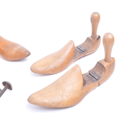 364 - Collection of early 20th century wooden shoe stretchers having spring joints and hinged articulated ... 