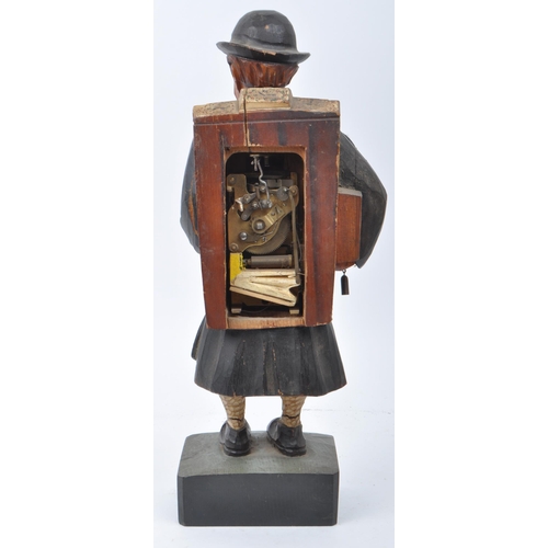 382 - An early 20th century circa 1940s Black Forest hand carved Whistler cuckoo clock figure. Gentleman h... 