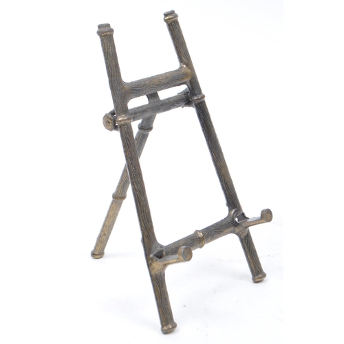 387 - Early 20th century Edwardian brass and wooden magazine rack with other brass wares including fire im... 