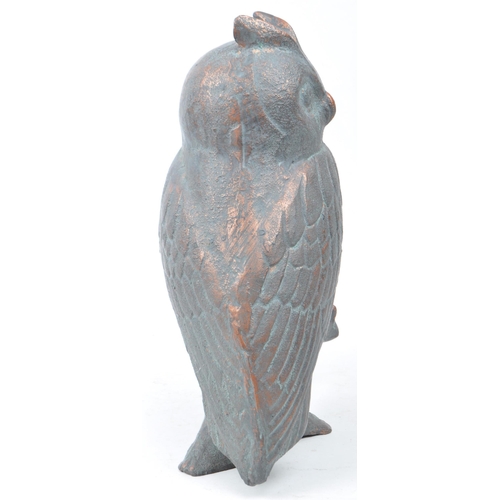 388 - 20th century cast copper owl sculpture depicting two owls sitting on a branch. Makers unknown. Measu... 